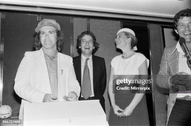 Princess Michael of Kent and Elton John at the Music Therapy Charity Luncheon at the Intercontinental Hotel in Park lane. Elton made the draw for the...