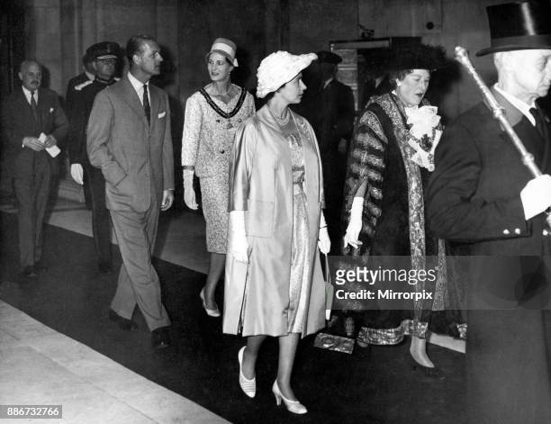 Queen Elizabeth II visiting Wales. Escorted by the Lord Mayor , the Queen enters the City Hall for the civic luncheon, followed by the Duke and Lady...