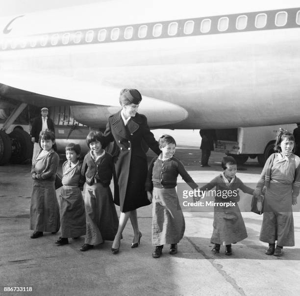 Tibetan Refugee Children land at London Heathrow Airport, Tuesday 26th February 1963. A BOAC Airliner brings the thirteen boys and eight girls to the...