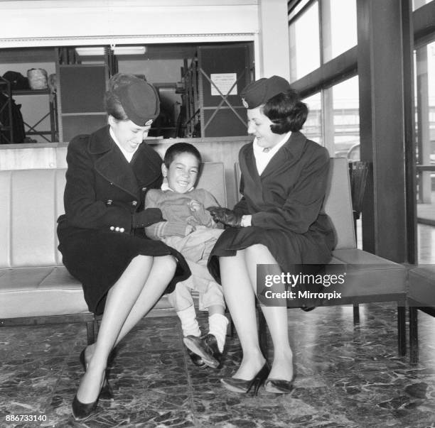 Tibetan Refugee Children land at London Heathrow Airport, Tuesday 26th February 1963. A BOAC Airliner brings the thirteen boys and eight girls to the...