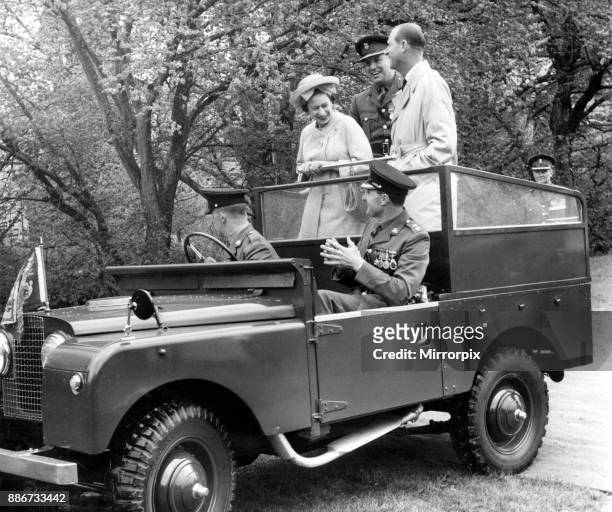 Queen Elizabeth II and the Duke of Edinburgh visit Wales. Pictured, the Queen and the Duke share a joke in the back of an open Land-Rover with the...