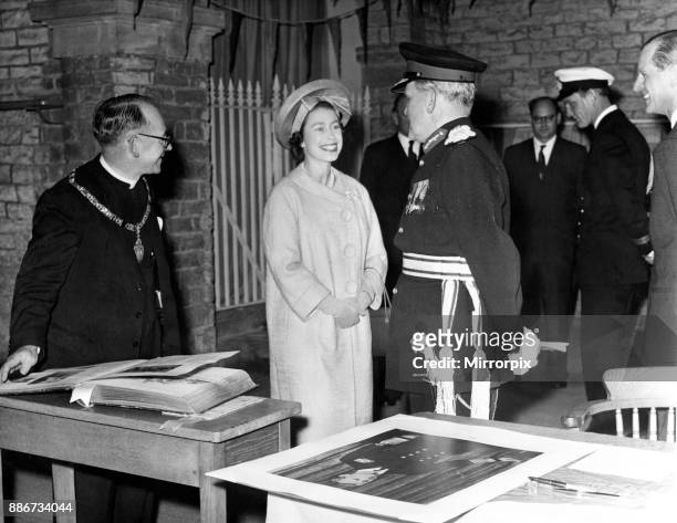Queen Elizabeth II and the Duke of Edinburgh visit Wales. Pictured, the Queen stops for a chat with the Lord Lieutenant of Breconshire, Sir William...
