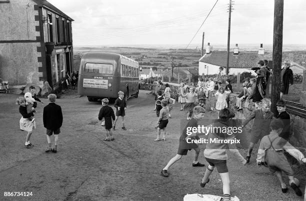 General shots of the village Rhiwlas, in Bangor, Gwynedd, Wales. Children playing outdoors, 20th September 1964.