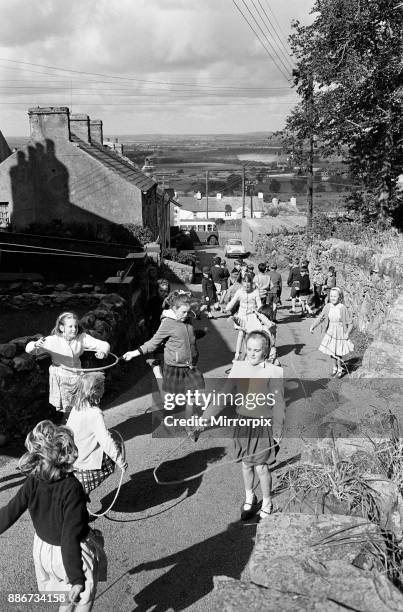 General shots of the village Rhiwlas, in Bangor, Gwynedd, Wales. Children playing outdoors, 20th September 1964.