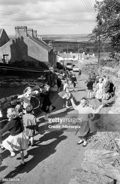 General shots of the village Rhiwlas, in Bangor, Gwynedd, Wales. Children playing outdoors, 20th September 1964.