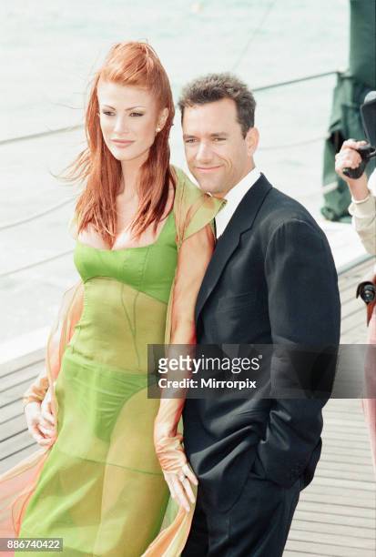 Cannes Film Festival 1997. The 50th Cannes Film Festival was held on 7th to 18th May 1997, our picture shows actress Angie Everhart and husband,...