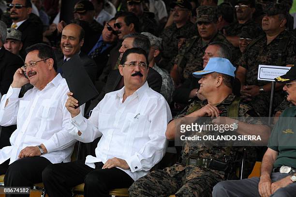 This June 8, 2009 file photo shows Defense Minister Edmundo Orellana , Honduran President Manuel Zelaya and the Armed Forces Joint Chief of Staff...