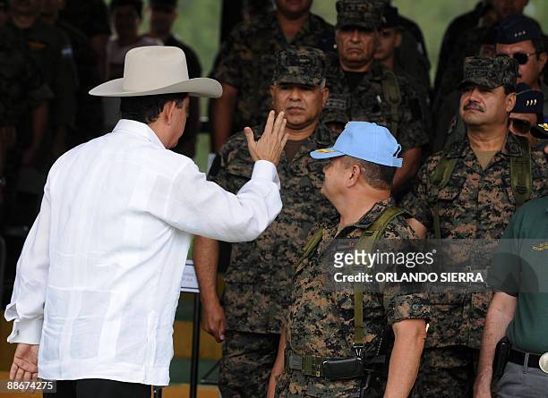 This June 8, 2009 file photo shows Honduran President Manuel Zelaya and the Armed Forces Joint Chief of Staff General Romeo Vasquez in Tegucigalpa....