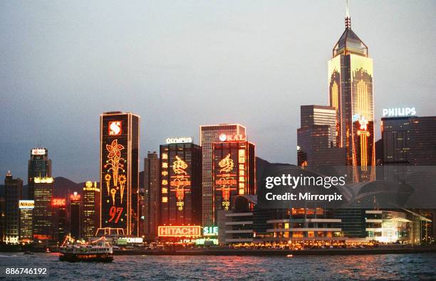 General view of the illuminated skyline at night time in Hong Kong , shortly before the official handover from Britain to China. June 1997.