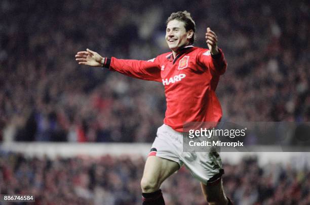 English Premier League match at Old Trafford. Manchester United 3 v Crystal Palace 0. Andrei Kanchelskis celebrates his goal to put United 3-0 in the...