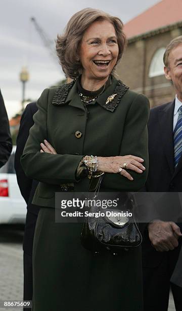Queen Sofia of Spain laughs during a guided tour of the Royal Australian Navy Heritage Centre at HMAS Kuttabul Navy Base, Garden Island on June 25,...