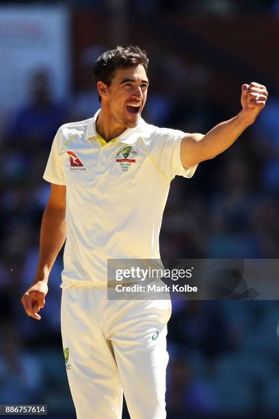 Mitchell Starc of Australia celebrates taking the wicket of Jonny Bairstow of England to win the test for Australia during day five of the Second...