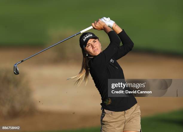 Klara Spilkova of the Czech Republic plays her third shot on the par 5, 10th hole during the first round of the 2017 Dubai Ladies Classic on the...