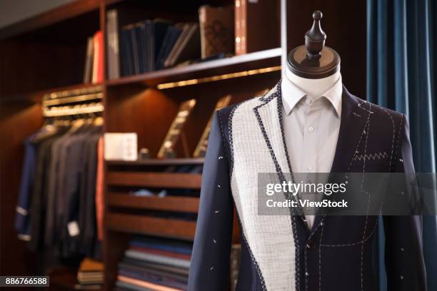 garment customization service - suit rack stock pictures, royalty-free photos & images