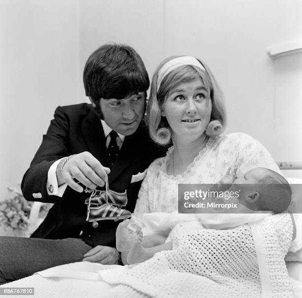 Jimmy Tarbuck and his wife Pauline pictured at Stanborough Hospital, Watford, with their new baby son, James, 17th July 1968.