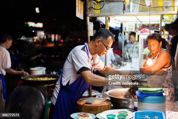 saturday night market in chiang mai, thailand - chiang mai sunday market stock pictures, royalty-free photos & images