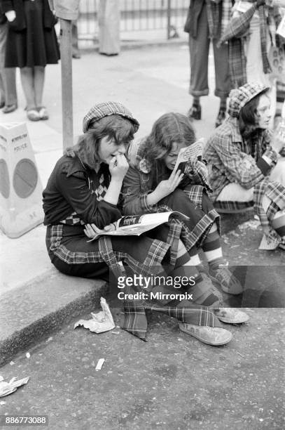 Hysterical Bay City Rollers fans outside the Odeon Hammersmith after the groups concert, 1st June 1975.