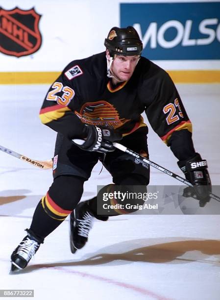 Martin Gelinas of the Vancouver Canucks skates against the Toronto Maple Leafs during NHL game action on March 17, 1996 at Maple Leaf Gardens in...