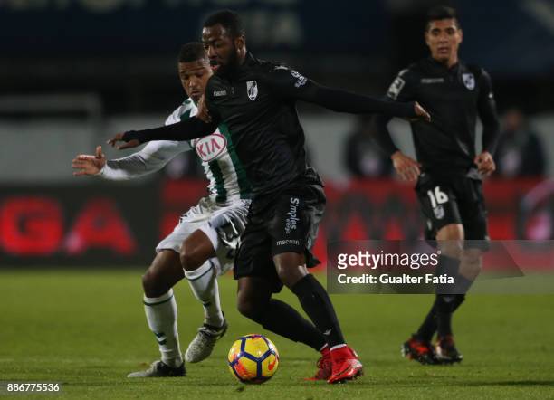 Vitoria Guimaraes forward Junior Tallo from Ivory Coast with Vitoria Setubal defender Vasco Fernandes from Guinea Bissau in action during the...