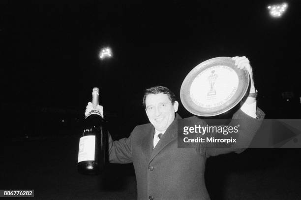 Graham Taylor, Aston Villa manager is presented with a jeroboam of champagne and award for his second consecutive Barclays Bank Manager of the Month...