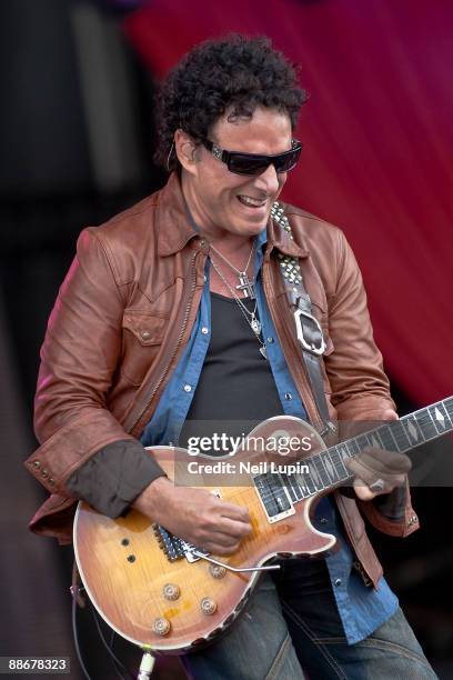 Neal Schon of Journey performs on the main stage on day 3 of the Download Festival at Donington Park on June 14, 2009 in Donington, England.