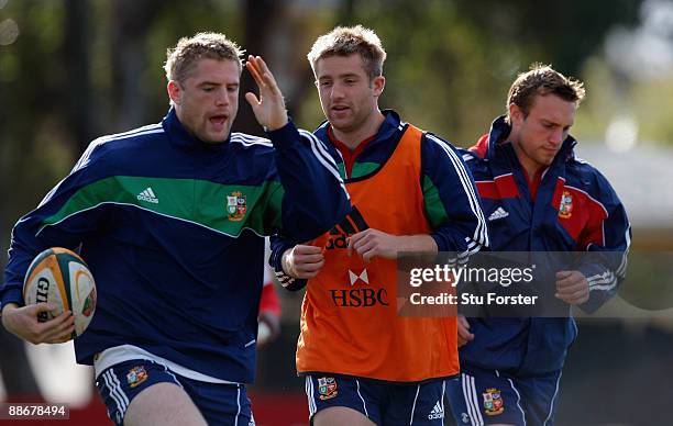 Lions players Jamie Heaslip Luke Fitzgerald and Mike Blair in action during British and Irish Lions training at Bishops school on June 25, 2009 in...