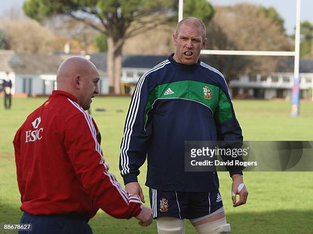 Paul O'Connell, the Lions captain talks to defence coach Shaun Edwards during the British and Irish Lions training session at Bishops School on June...