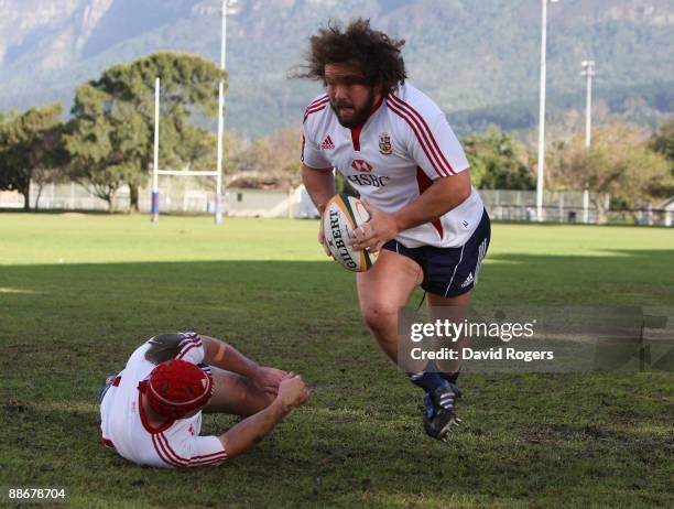 Adam Jones, the Lions prop, runs with the ball during the British and Irish Lions training session at Bishops School on June 25, 2009 in Cape Town,...