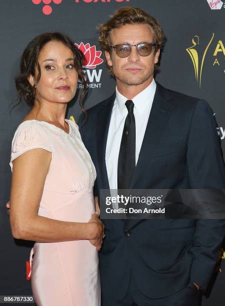 Rebecca Rigg and Simon Baker pose during the 7th AACTA Awards at The Star on December 6, 2017 in Sydney, Australia.