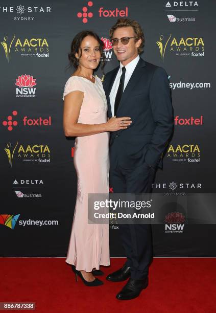 Rebecca Rigg and Simon Baker pose during the 7th AACTA Awards at The Star on December 6, 2017 in Sydney, Australia.