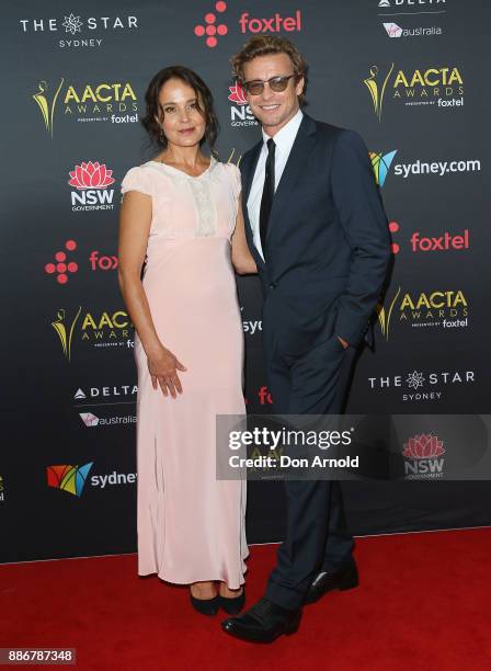 Rebecca Rigg and Simon Baker pose during the 7th AACTA Awards at The Star on December 6, 2017 in Sydney, Australia.