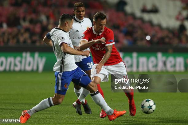 Benficas forward Haris Seferovic from Switzerland and Fc Basel defender Marek Suchy from Czech Republic during the match between SL Benfica v FC...