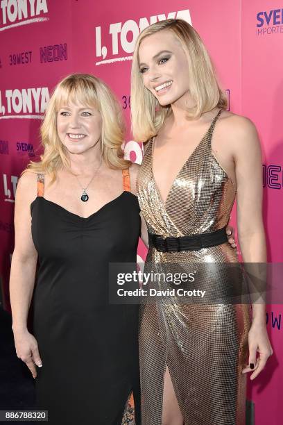 Tonya Harding and Margot Robbie attend the Los Angeles Premiere Of "I, Tonya" - Arrivals on December 5, 2017 in Hollywood, California.