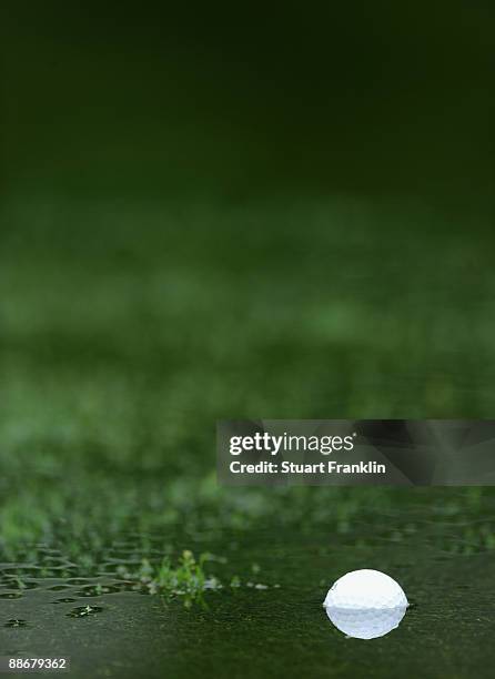 Player ball swims in water laying on the fairway during the first round of The BMW International Open Golf at The Munich North Eichenried Golf Club...