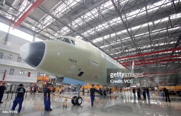 An unfinished Airbus A320 is seen in a hangar at the Tianjin Airbus factory on June 23, 2009 in Tianjin, China. European aviation giant Airbus...