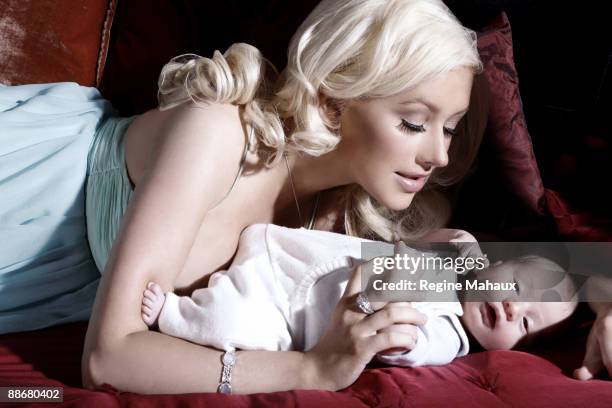 Christina Aguilera poses with her son Max Liron Bratman on February 9, 2008 in their Los Angeles, California home.