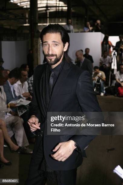 Actor Adrien Brody attends Hugo by Hugo Boss show as part of Paris Menswear Fashion Week Spring/ Summer 2010 on June 25, 2009 in Paris, France.