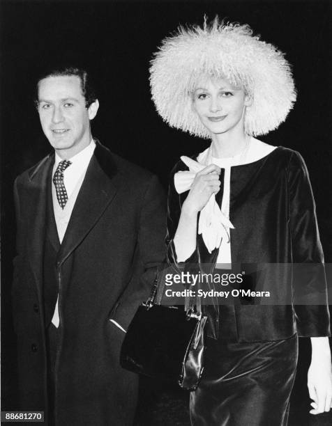 Television executive and socialite Brinsley Black and his wife attend the wedding reception of Edwina Sandys and Pierson John Shirley Dixon, December...