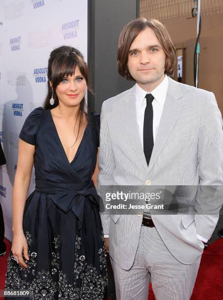 Actress Zooey Deschanel and musician Ben Gibbard arrive on the red carpet of the Los Angeles premiere of " Days Of Summer" at the Egyptian Theatre on...