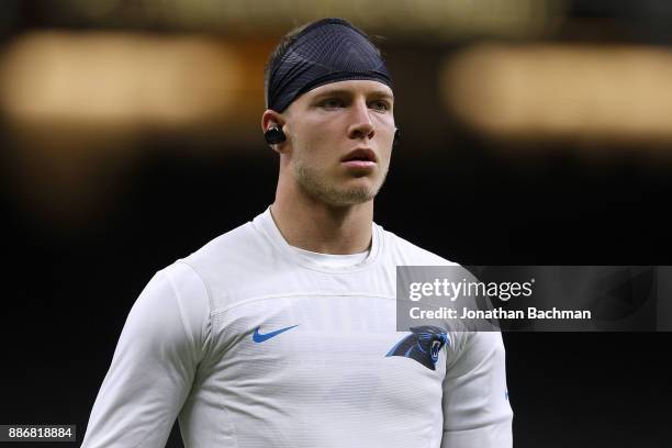 Christian McCaffrey of the Carolina Panthers warms up before a game against the New Orleans Saints at the Mercedes-Benz Superdome on December 3, 2017...