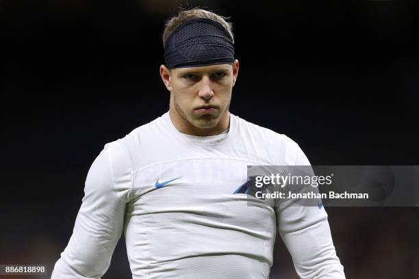 Christian McCaffrey of the Carolina Panthers warms up before a game against the New Orleans Saints at the Mercedes-Benz Superdome on December 3, 2017...