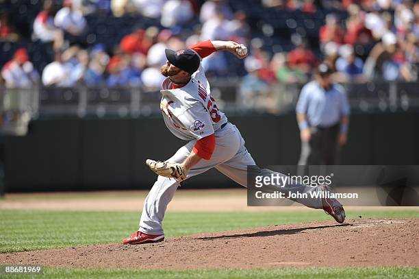 Jason Motte of the St. Louis Cardinals pitches during the game against the Kansas City Royals at Kauffman Stadium in Kansas City, Missouri on Sunday,...
