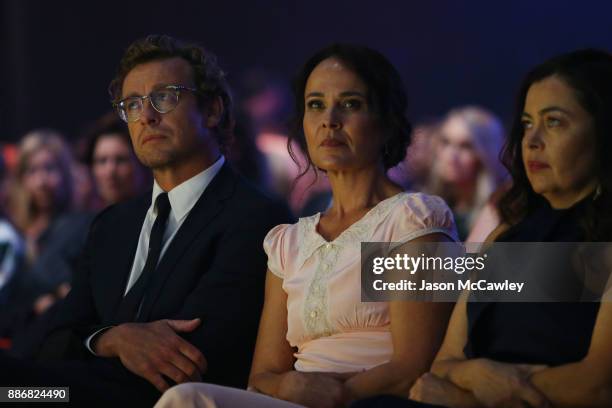 Simon Baker and Rebecca Rigg look on during the 7th AACTA Awards Presented by Foxtel | Ceremony at The Star on December 6, 2017 in Sydney, Australia.