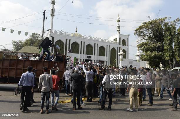 Members of the Darsgah Jihad-O-Shahadat Muslim group take part in a protest on the 25th anniversary of the demolition of the Babri Masjid, in...