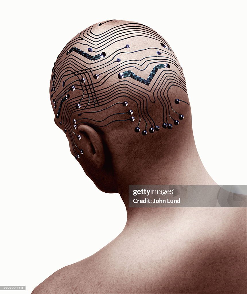 Circuit board design on man's bald head (Digital Composite)