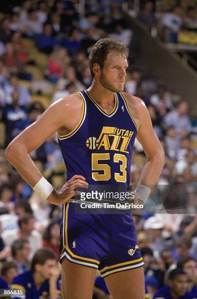 Mark Eaton of the Utah Jazz stands on the court during an NBA game against the Los Angeles Lakers at the Great Western Forum in Los Angeles,...