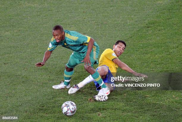 South African forward Bernard Parker fights for the ball with Brazilian defender Andre Santos during the Fifa Confederations Cup semi-final football...