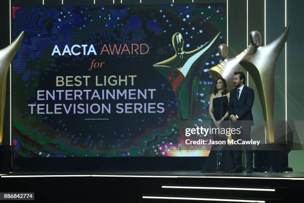 Nicole da Silva and Ewen Leslie present the AACTA Award for Best Light Entertainment Television Series during the 7th AACTA Awards Presented by...