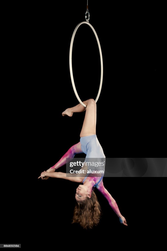 Aerial dancer performance with ring