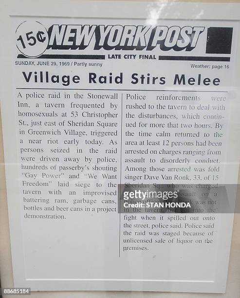 Reproduction of a June 29, 1969 New York Post story about a police raid that led to the Stonewall riots on display at the Stonewall Inn on...